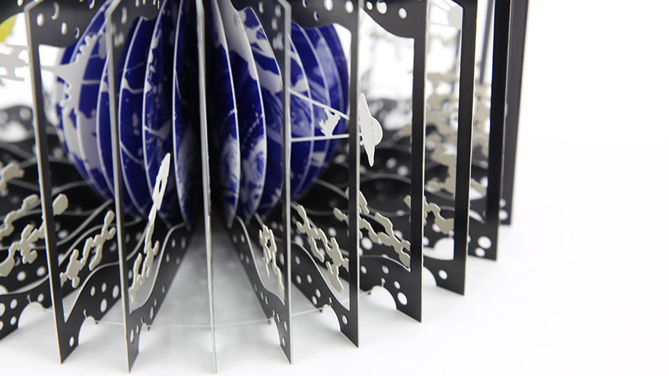 EARTH AND THE MOON 360°BOOK by Yusuke Oono, published by Seigenha Art Publishing. Carefully crafted paper art book with a 360-degree panoramic scene of layered silhouettes.