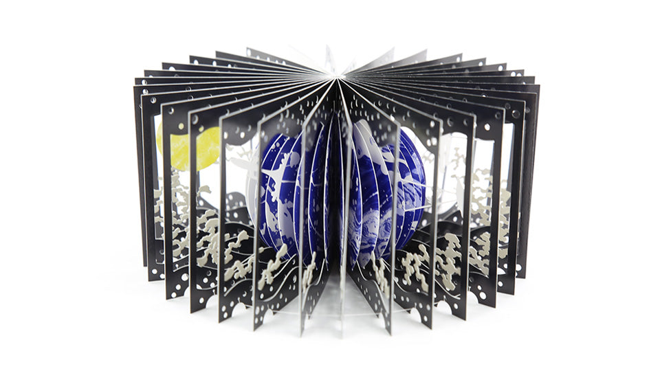 EARTH AND THE MOON 360°BOOK by Yusuke Oono, published by Seigenha Art Publishing. Carefully crafted paper art book with a 360-degree panoramic scene of layered silhouettes.