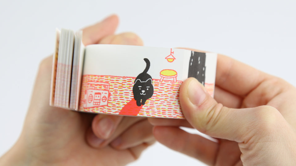 Cute cat flip book "In a Kitten's Way of Greeting" by Japanese artist Harumin Asao, published by Seigensha Art Publishing in 2011.