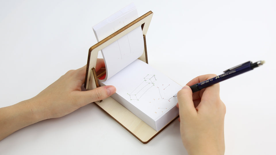 THE HOLDER PACK – Get your Dots &amp; Lines Puzzle Flipbook with your Flipboku Holder, a great tool that makes your life easier and the drawing process more comfortable.