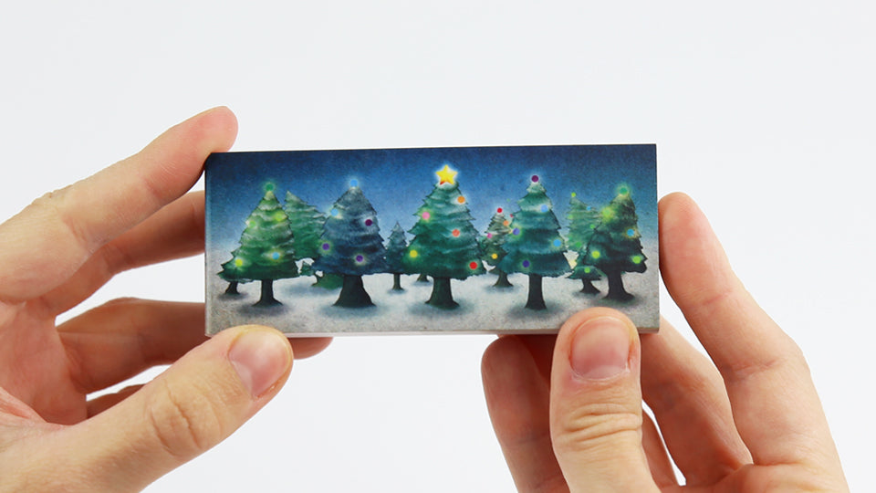 Christmas flip book by Mohiken, published by Seigensha Art Publishing in 2011. 