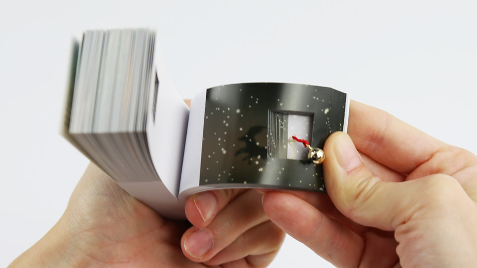 Christmas flip book by Mohiken, published by Seigensha Art Publishing in 2011. 